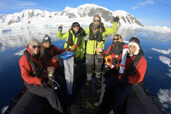 Oceanographers on a boat in the arctic.