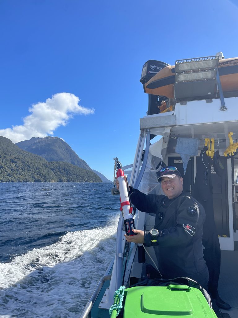 John Carter (Department of Conservation) prepares to profile one Patea/Doubtful Sound’s deep basin as part of a research collaboration to understand deep-water renewal in New Zealand’s southwestern fjords. Credit: Lucy Coyle.